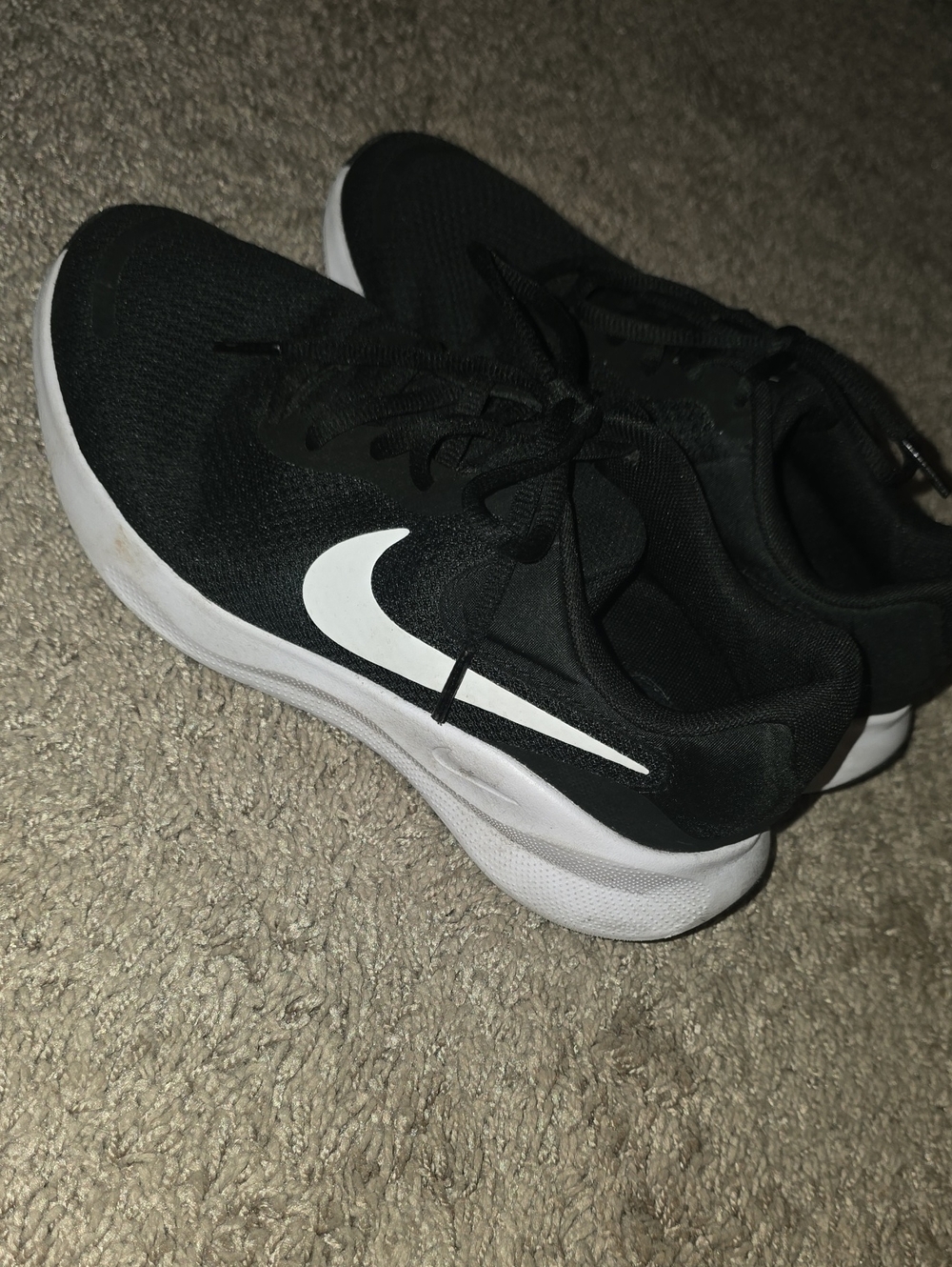 Nike Women's Black Sneakers with White Swoosh